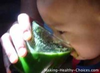 Baby Drinking Green Juice